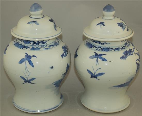 A pair of Chinese blue and white jars and covers, late 19th century, 28cm